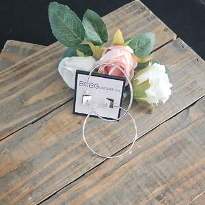 BCBGeneration Shimmering Silver Hoop Earrings